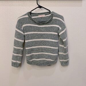 This is a girls green fall or winter sweater!